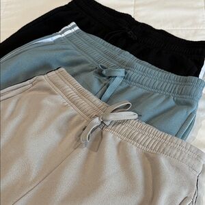 Men's Black, Teal and Tan Open Bottom Striped Fleece Pants. Pack Of 3
